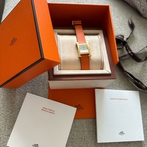 Orange and gold Hermes watch. Purchased for $3800